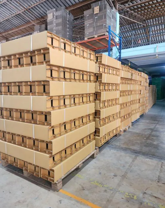 Paper pallets with partitions stacked in the warehouse